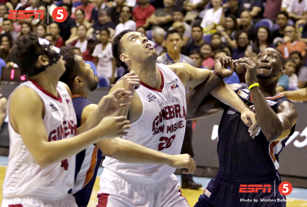 _S1A8763 Ginebra's Greg Slaughter battles for the rebound with Meralco's Allen Durham
