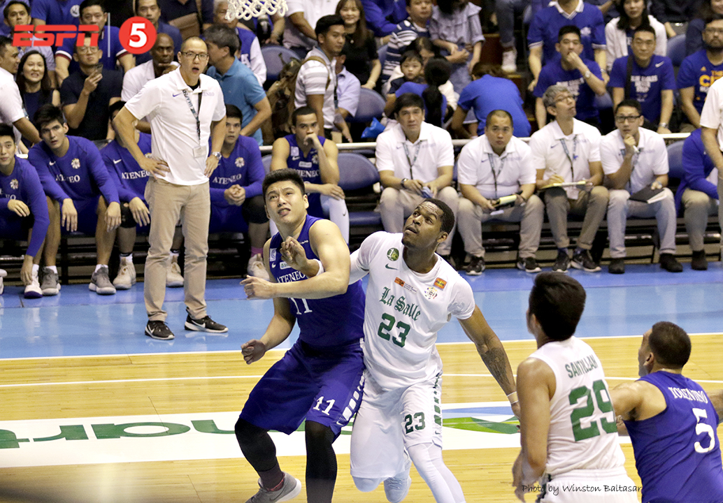 _S1A9381 Isaac Go and Ben Mbala jockeying for the rebound