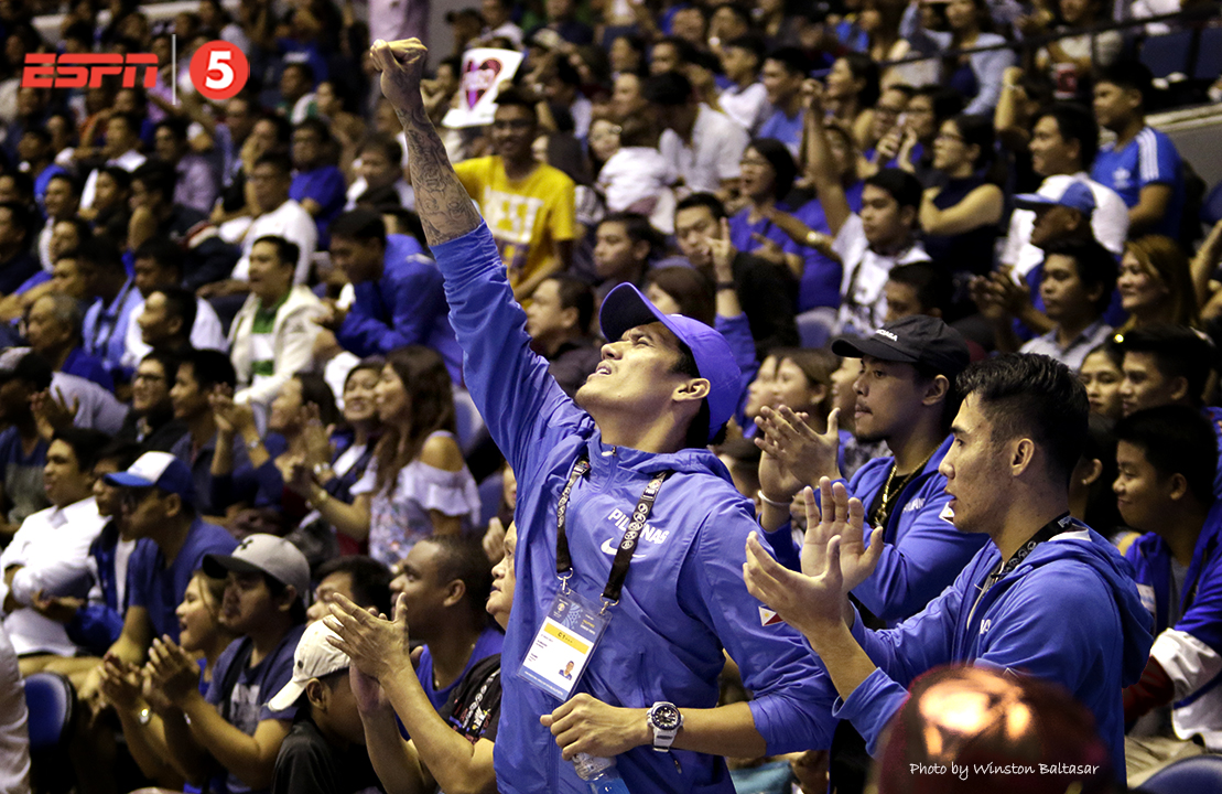 _S1A9185 Injured Gilas mainstays Raymond Almazan, Terrence Romeo, and Mac Belo cheer from the galleries
